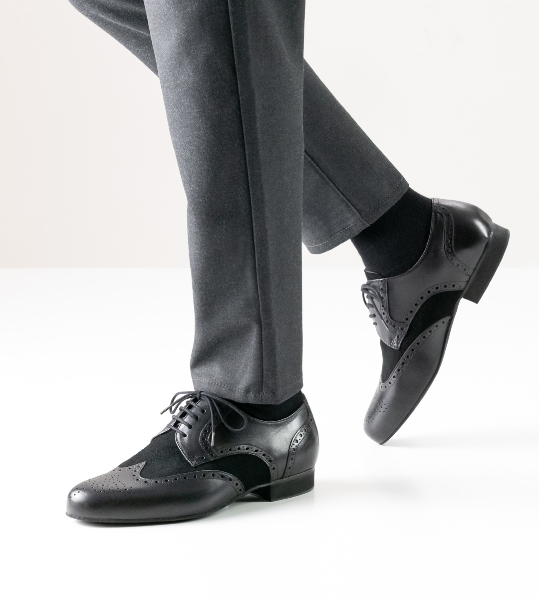 Werner Kern men's dance shoe in black suede and leather in combination with trousers in grey