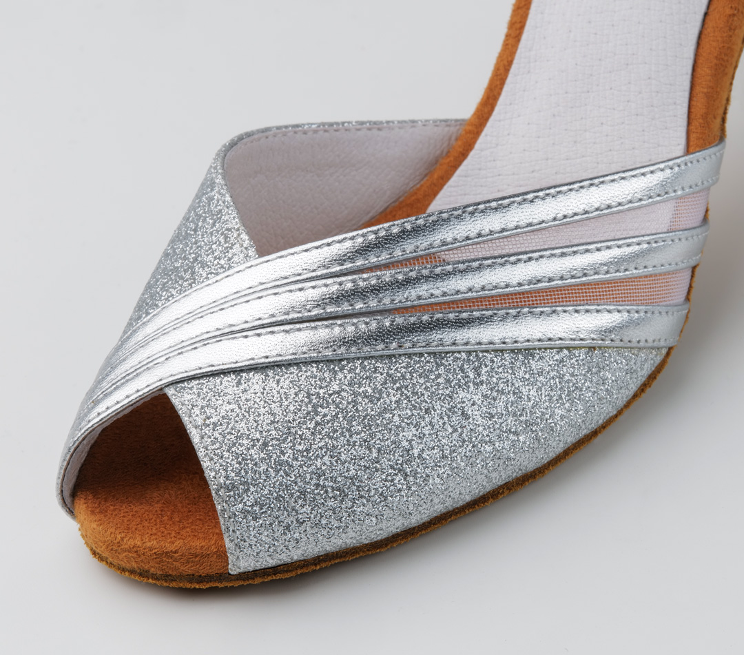 Detail picture of Christelle, silver dance shoe with asymmetric, classic design.