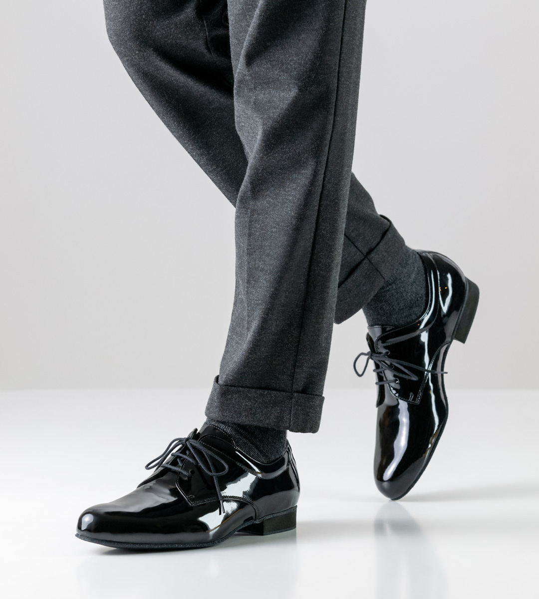 Grey trousers in combination with 2 cm high Werner Kern men's dance shoe for standard dances