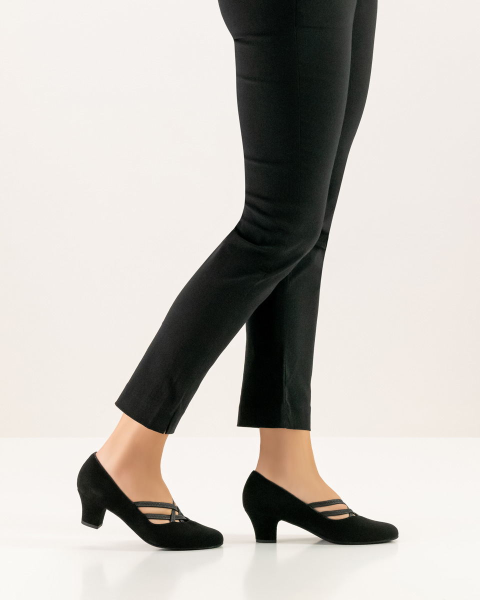 black Werner Kern ladies dance shoe from the side combined with black trousers