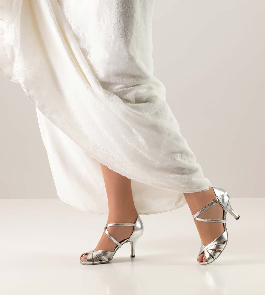 Yolanda White wedding dress in combination with silver coloured bridal shoe