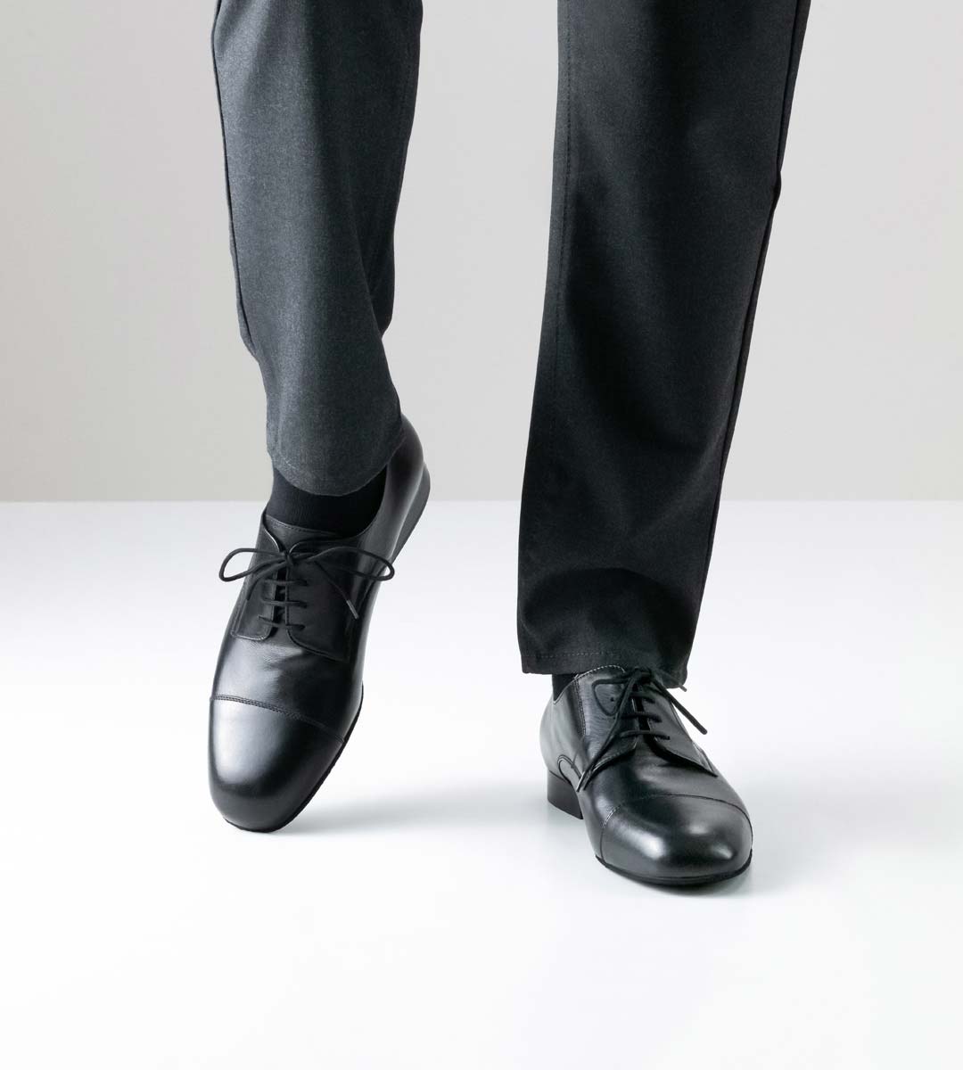 Imola Men's dance shoe for wide feet by Werner Kern in combination with grey trousers