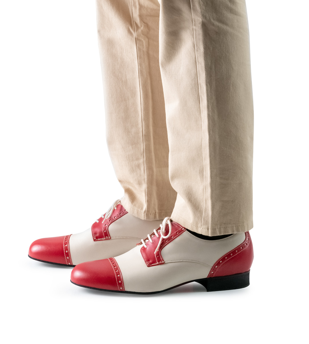 Two-tone men's dance shoe by Werner Kern in combination with beige trousers