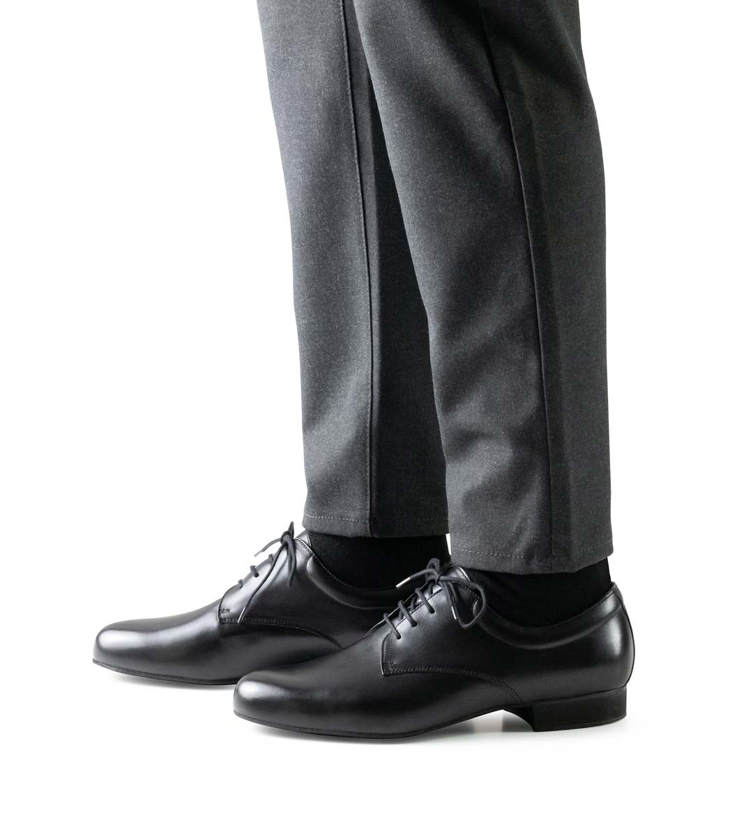 Capri Side view of the Werner Kern men's dance shoe with padded edge in combination with grey trousers