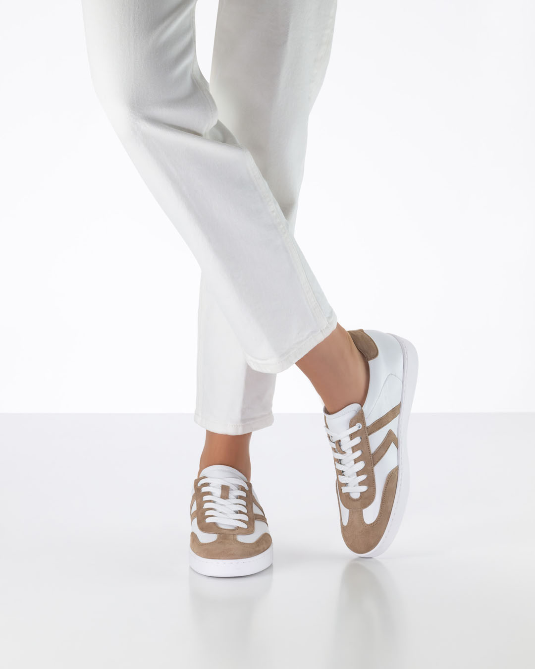White women’s leather dance trainers with a lightweight PU sole by Werner Kern