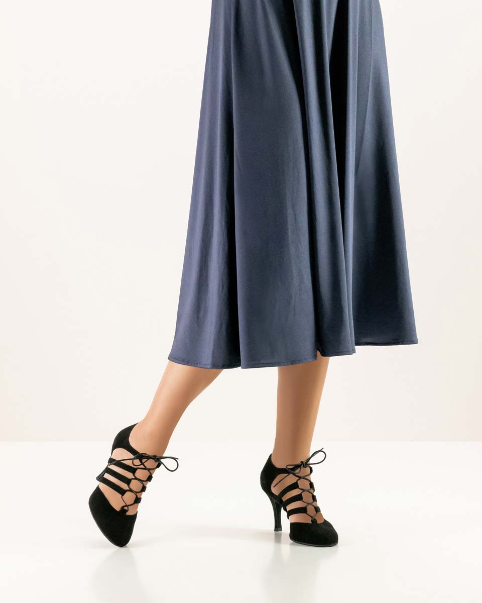 April Nueva Epoca ladies' lace-up dance shoe in combination with grey skirt