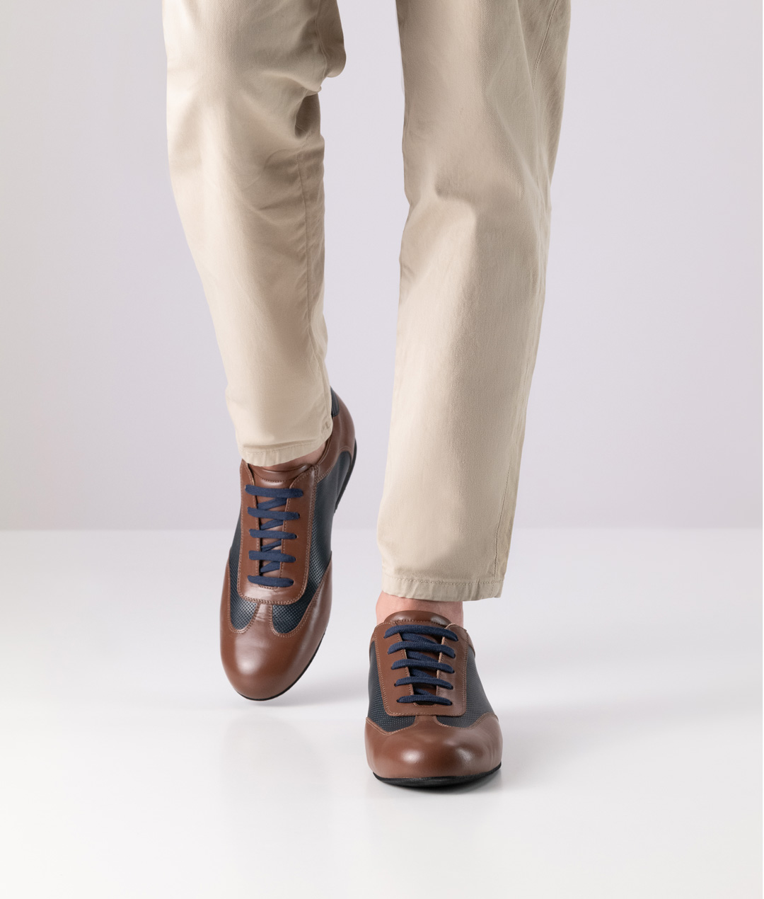 Combination of fine nappa leather in cognac and dark blue for the Positano men's sports dance shoe by Werner Kern.
