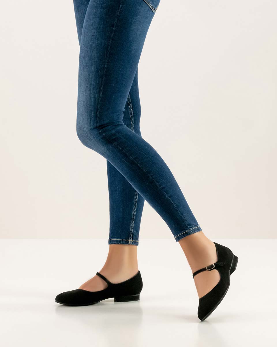 Vega black dance shoe ballerina on both feet