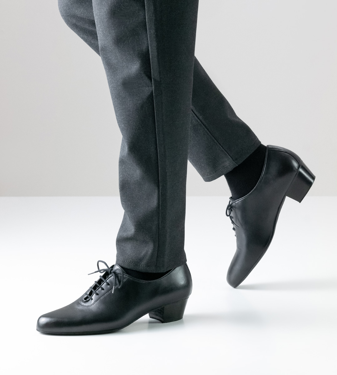 black men's dance shoe in nappa in combination with black trousers